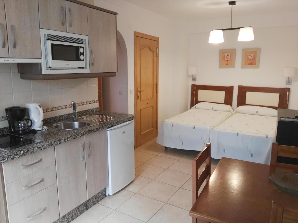 Apartamentos El Barrio ネルハ エクステリア 写真